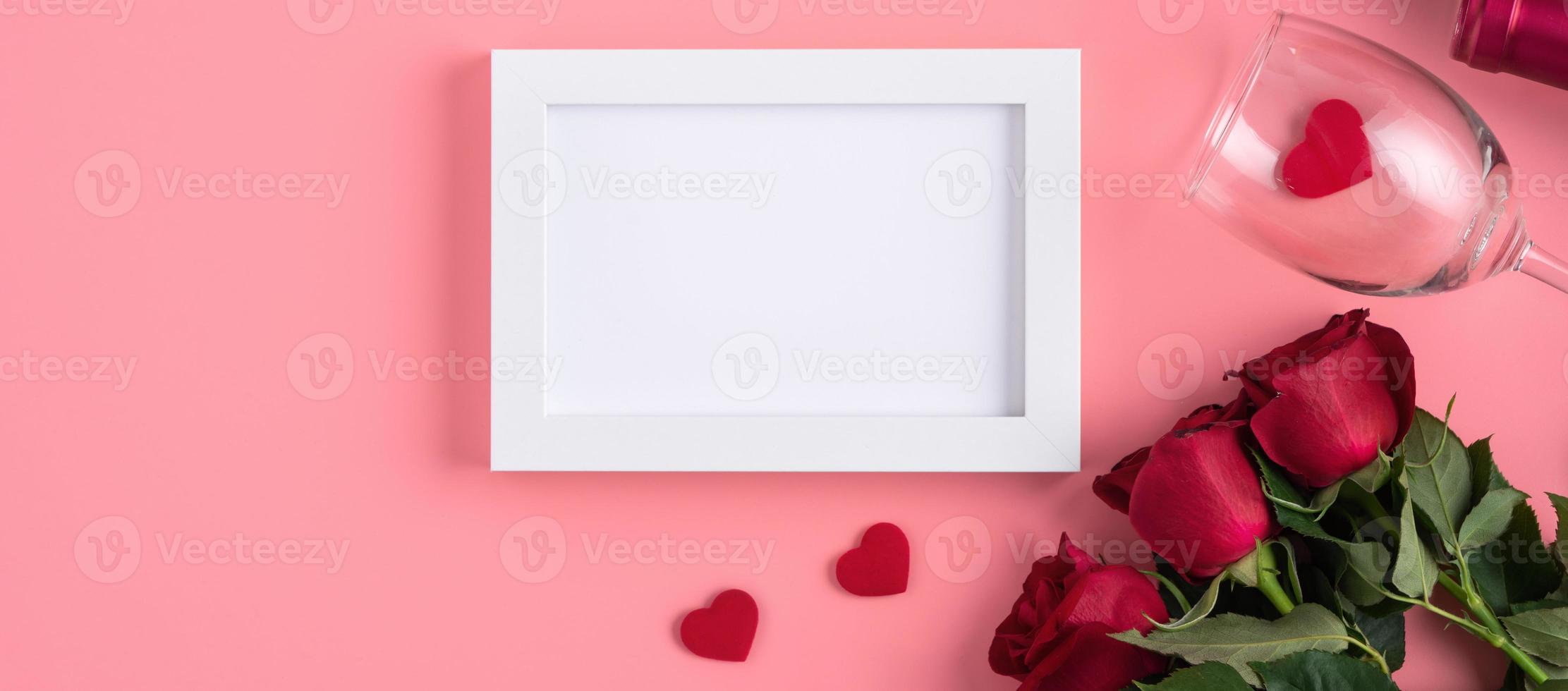 Valentine's Day memory with picture frame concept on pink background photo