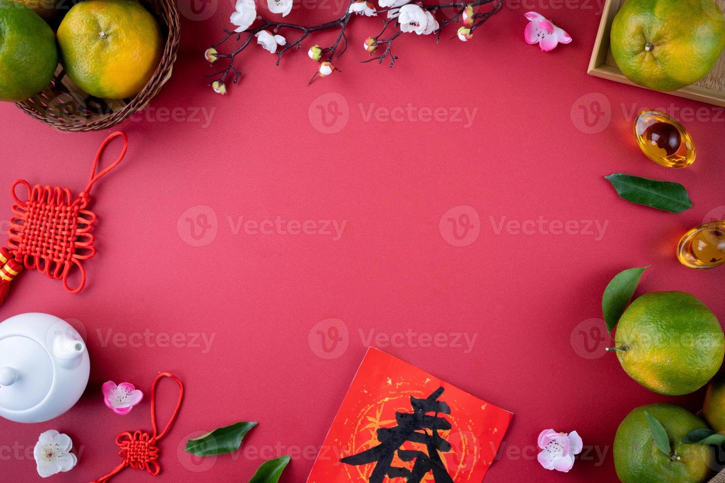 Top view of fresh tangerine mandarin orange on red background for Chinese lunar new year. photo