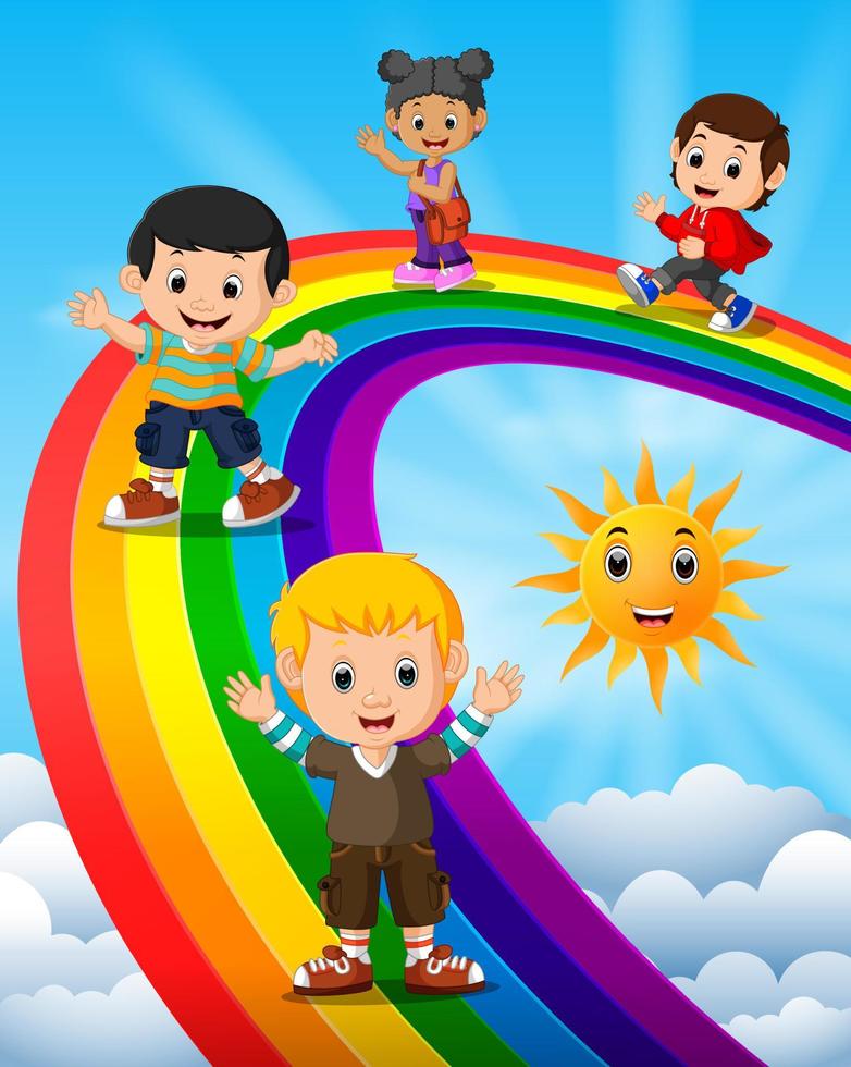 niños felices de pie sobre el arco iris vector