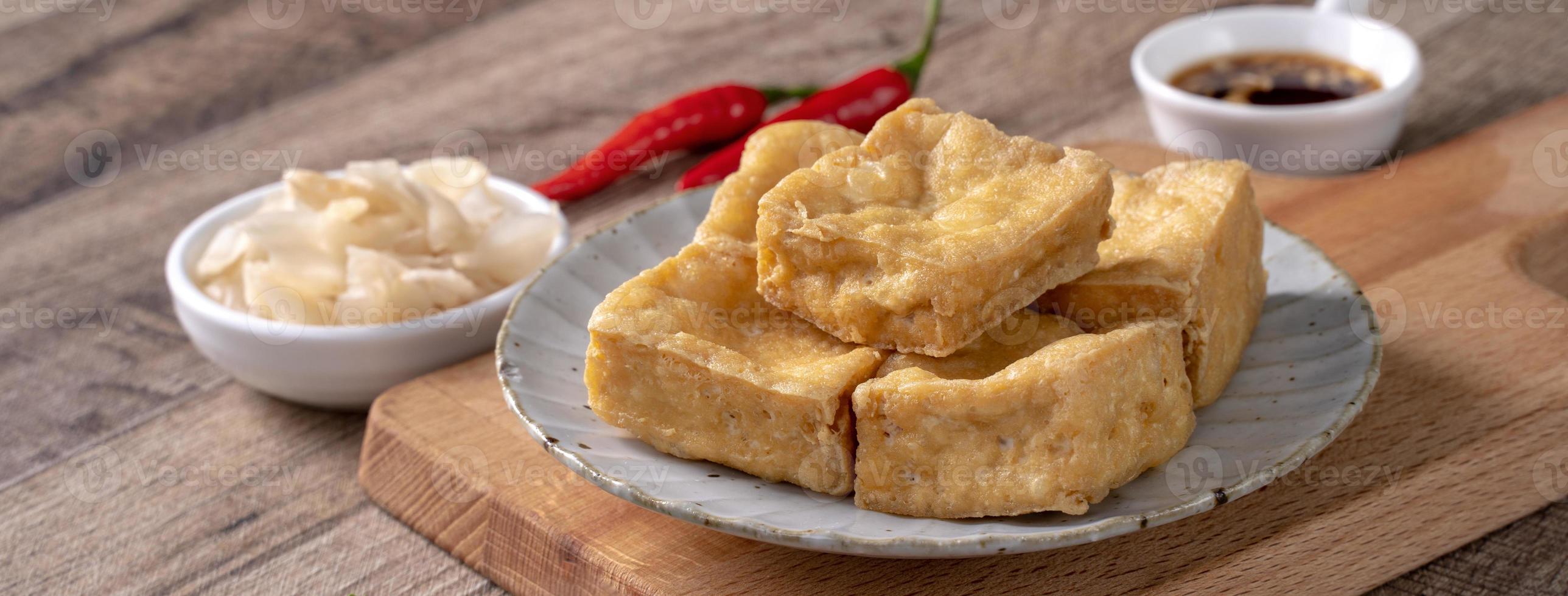 Deep fried stinky tofu with pickled cabbage street food in Taiwan. photo