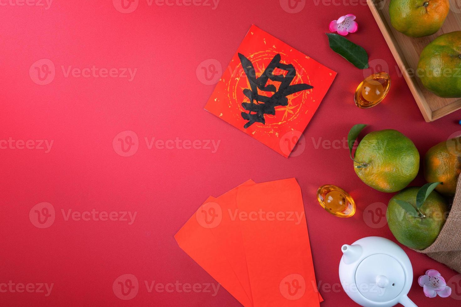 Top view of fresh tangerine mandarin orange on red background for Chinese lunar new year. photo