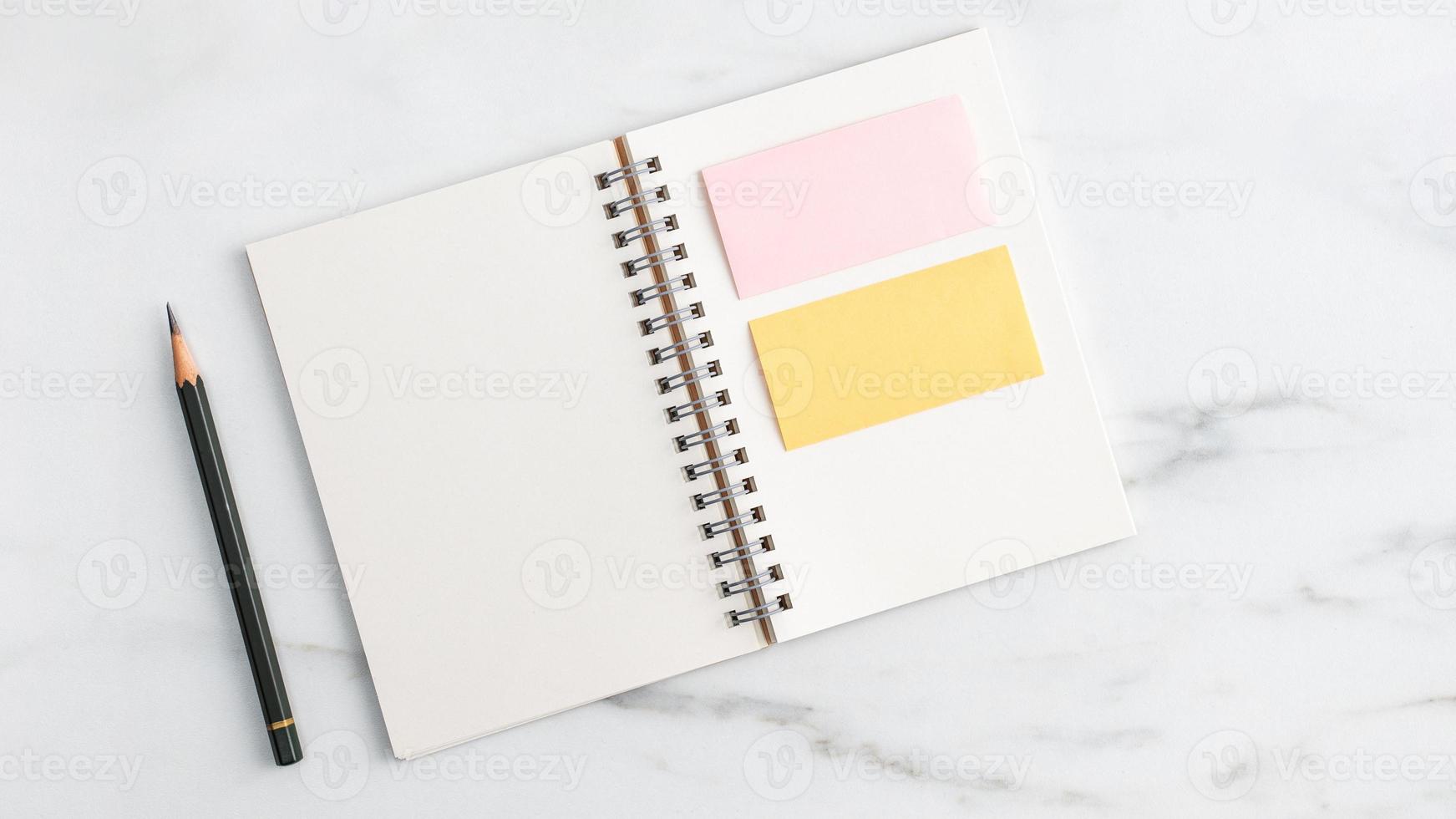 Top view of office table desk cozy work concept on bright marble white background. photo