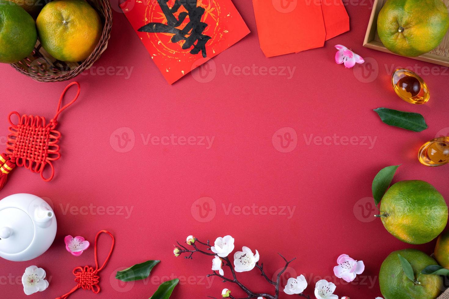 Top view of fresh tangerine mandarin orange on red background for Chinese lunar new year. photo