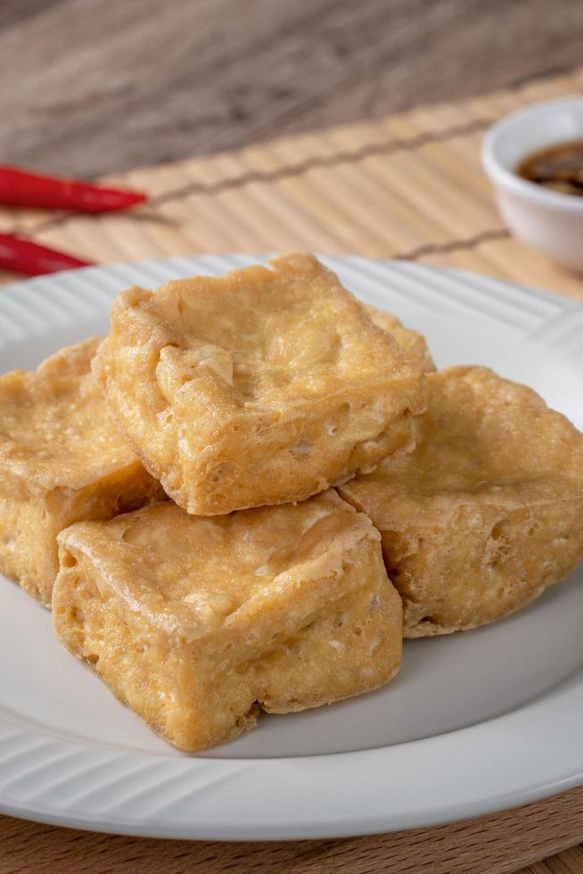 Deep fried stinky tofu with pickled cabbage street food in Taiwan. photo