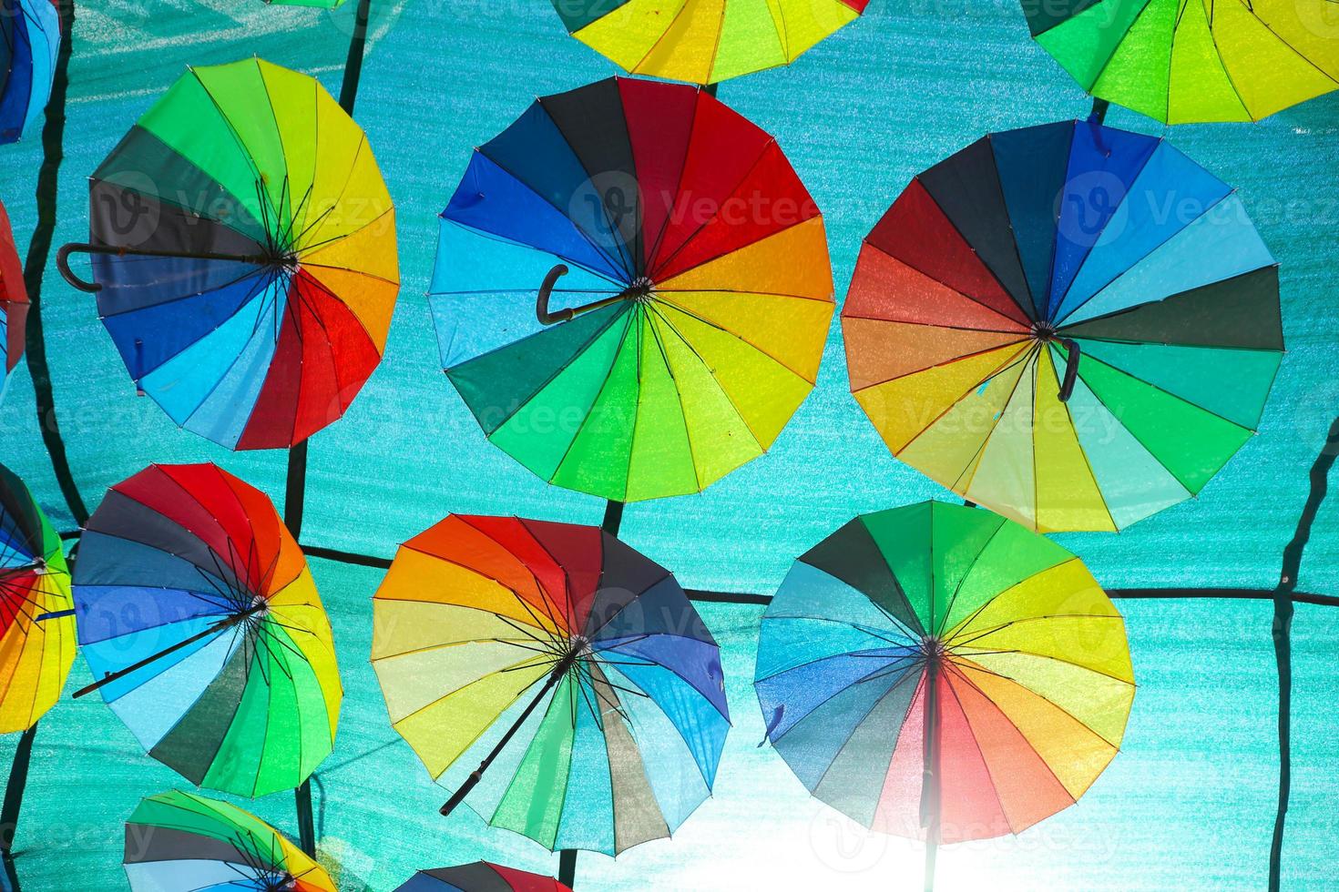 Sky decorated with colored umbrellas photo