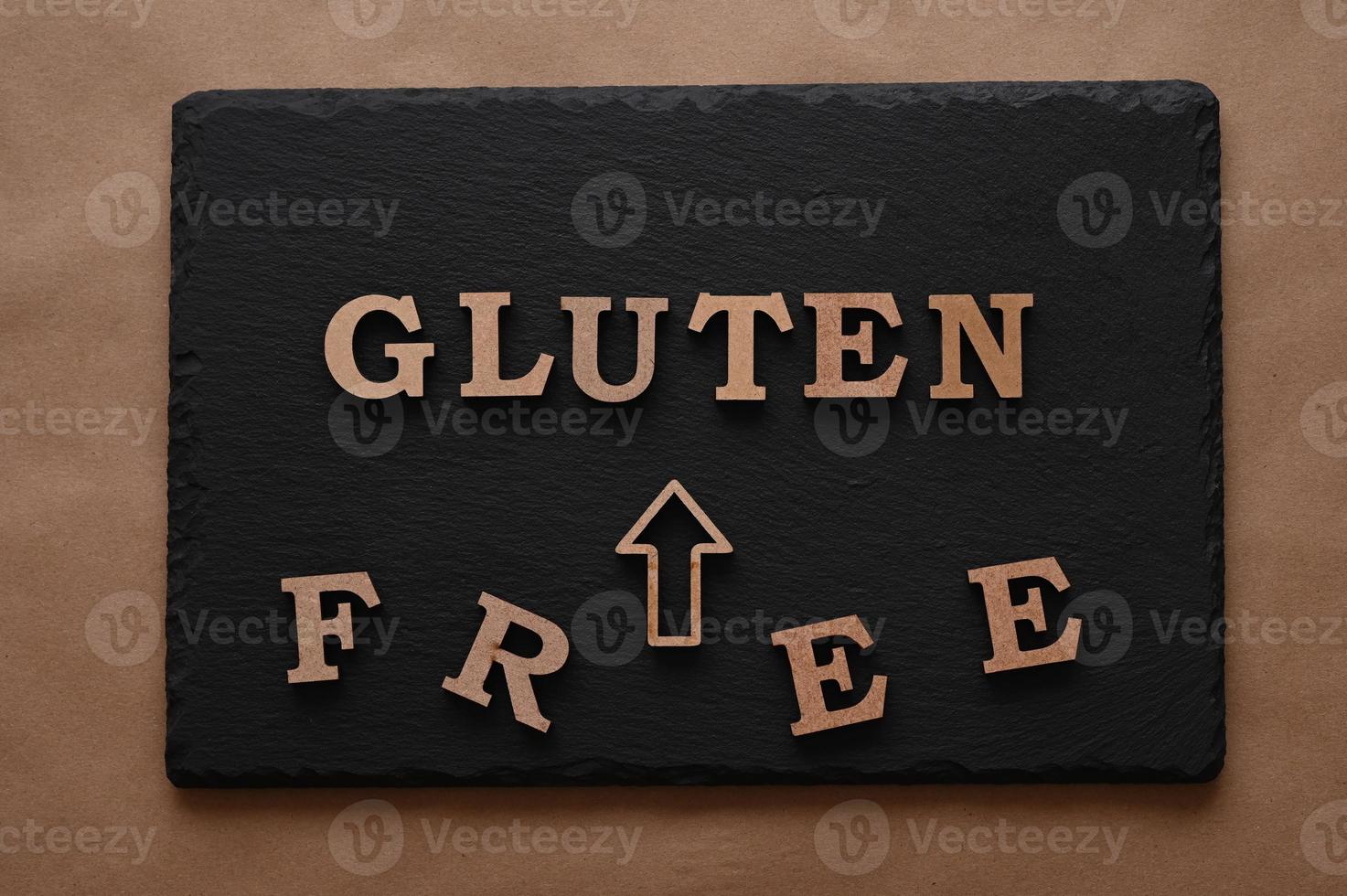 The letters Gluten free on a black background photo