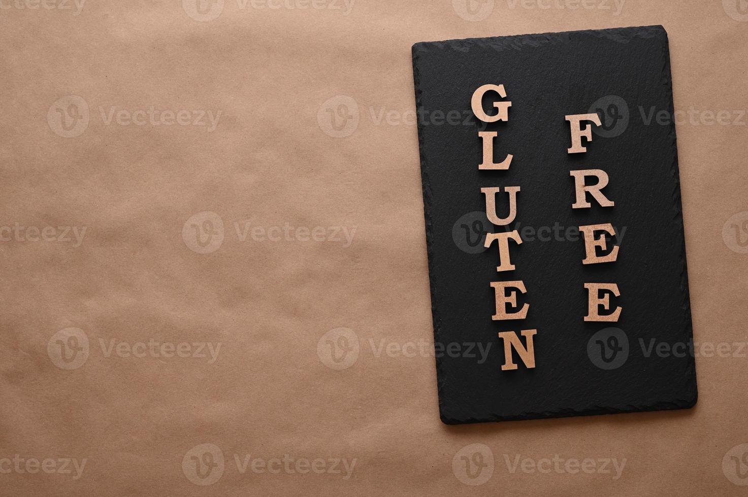 The letters Gluten free on a black background photo