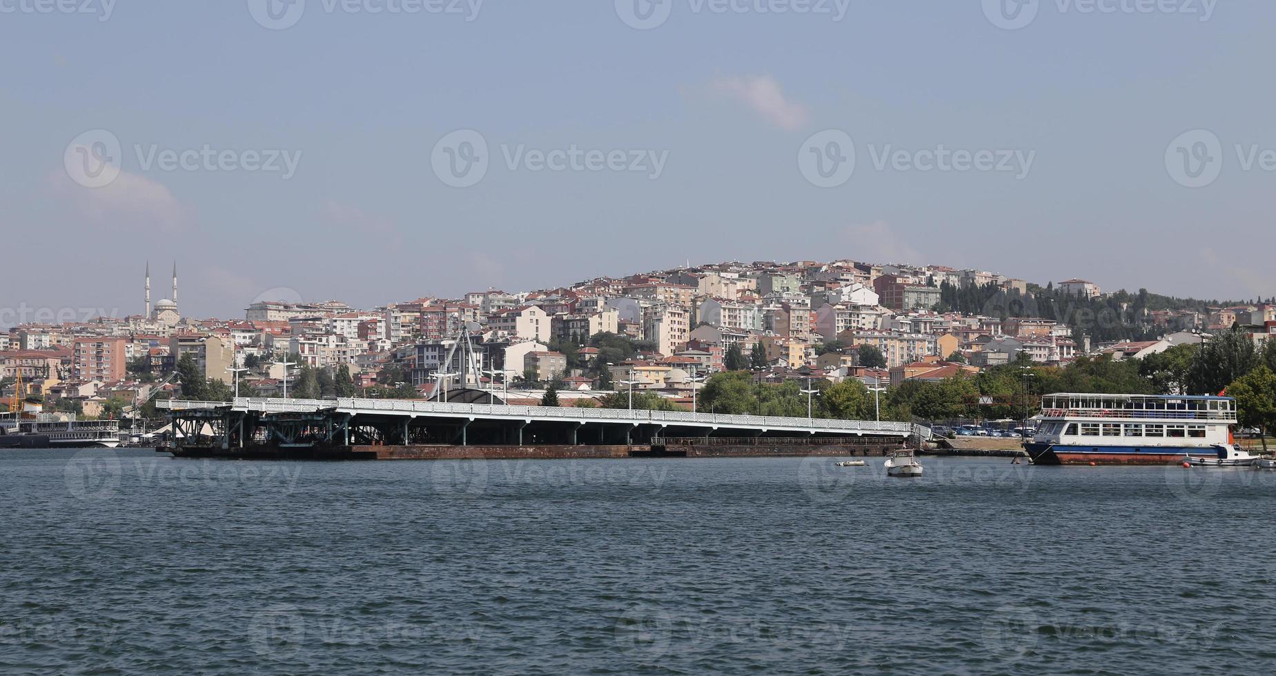 Old Galata Bridge in Golden Horn, Istanbul photo