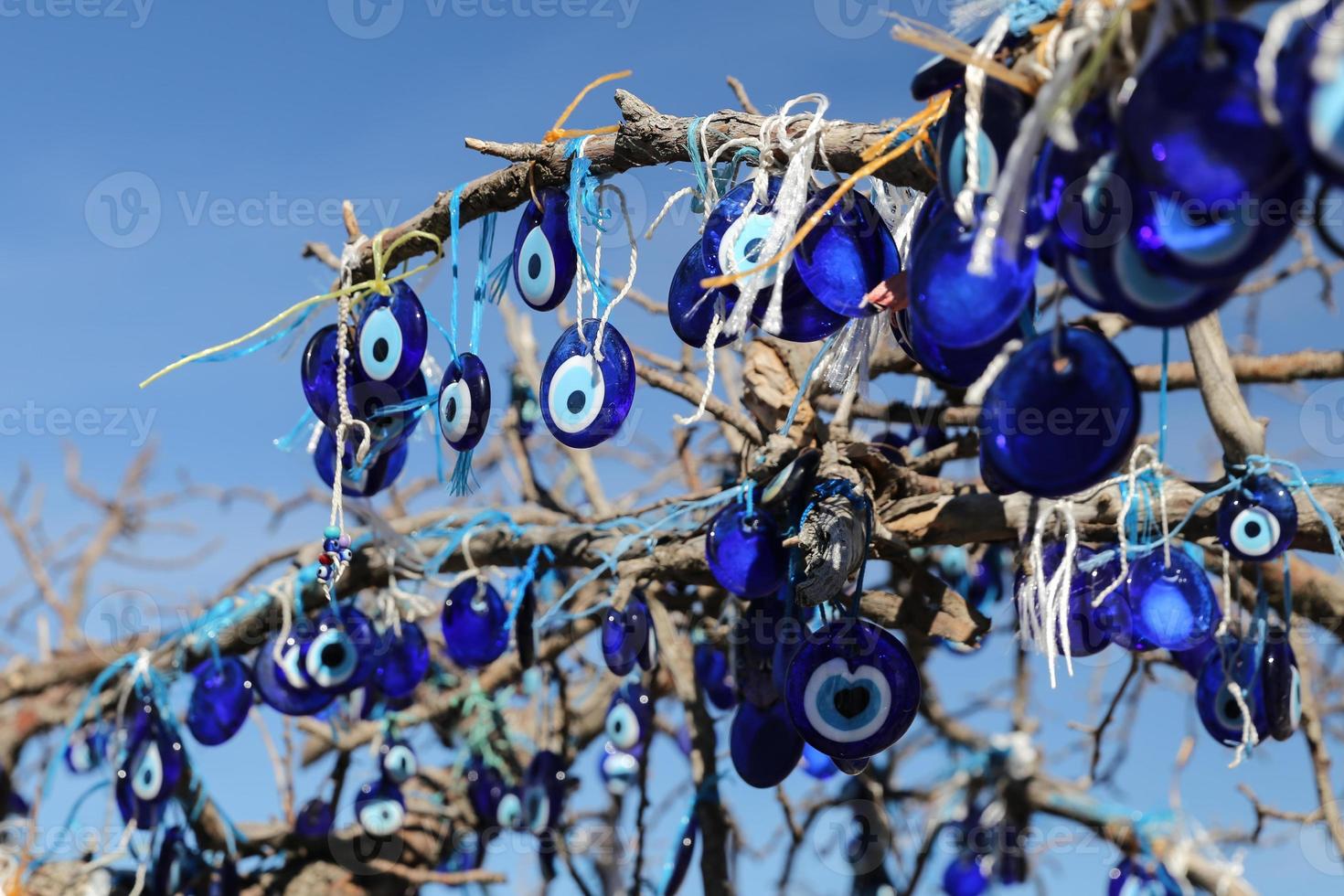 Evil Eye Beads Tree in Pigeons Valley, Cappadocia, Nevsehir, Turkey photo