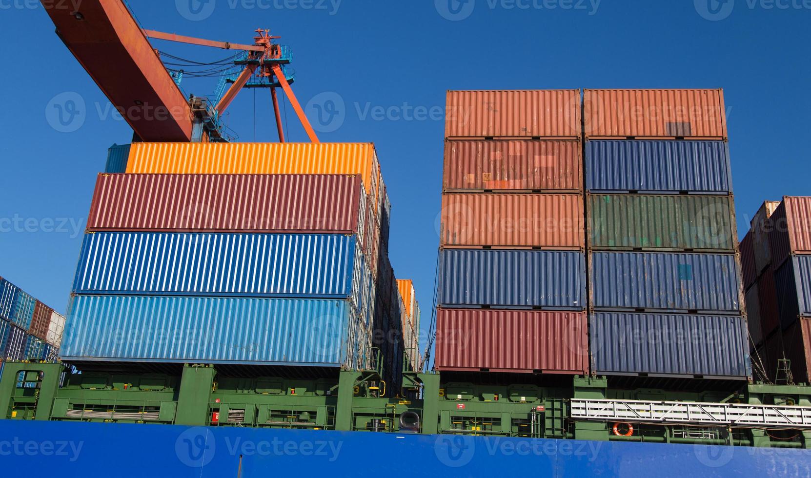 Container Ship is loading in a port photo