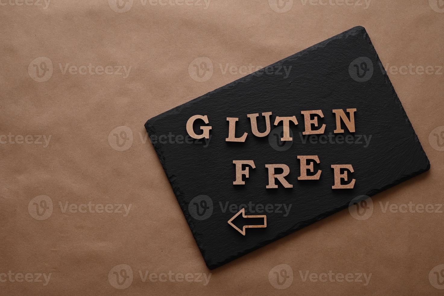 The letters Gluten free on a black background photo