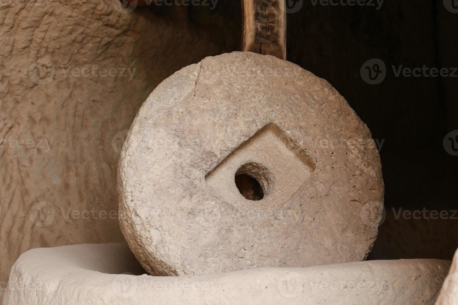 Millstone in Zelve Valley, Cappadocia photo