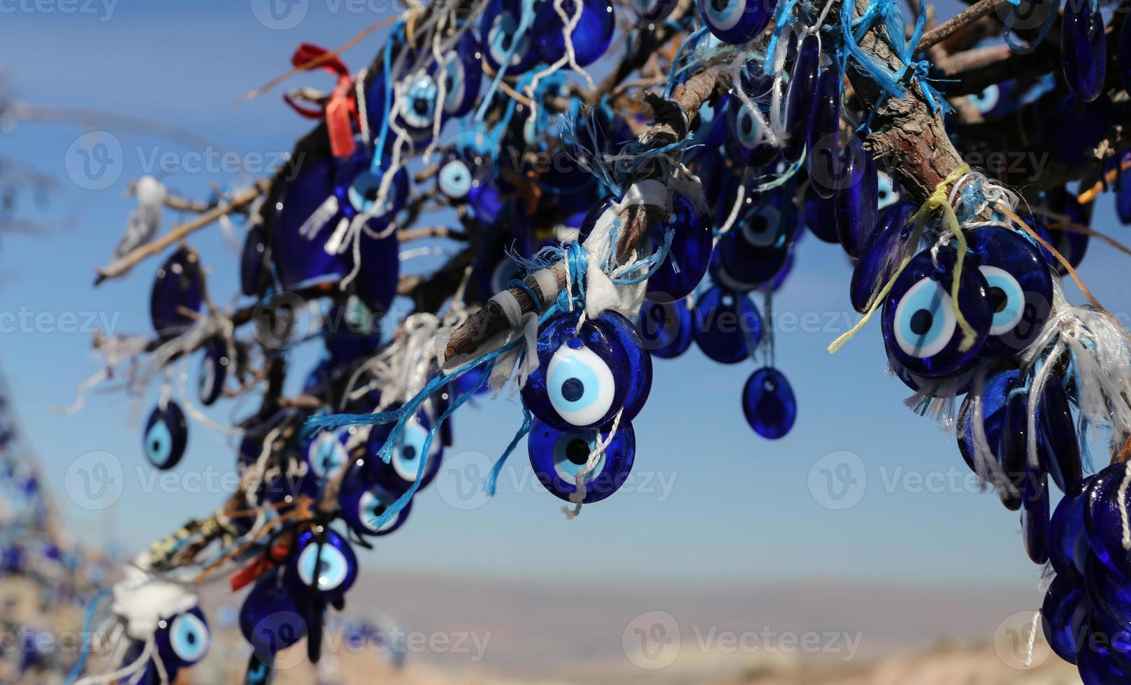 Evil Eye Beads Tree in Pigeons Valley, Cappadocia, Nevsehir, Turkey photo