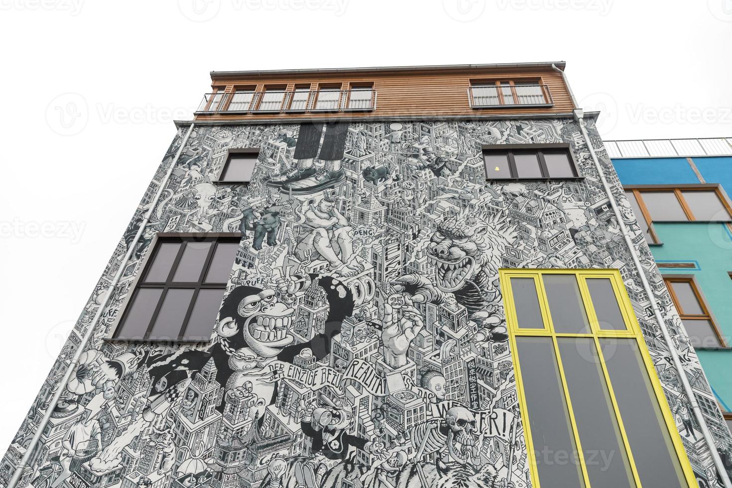 Building Covered with Cartoon in Berlin, Germany photo
