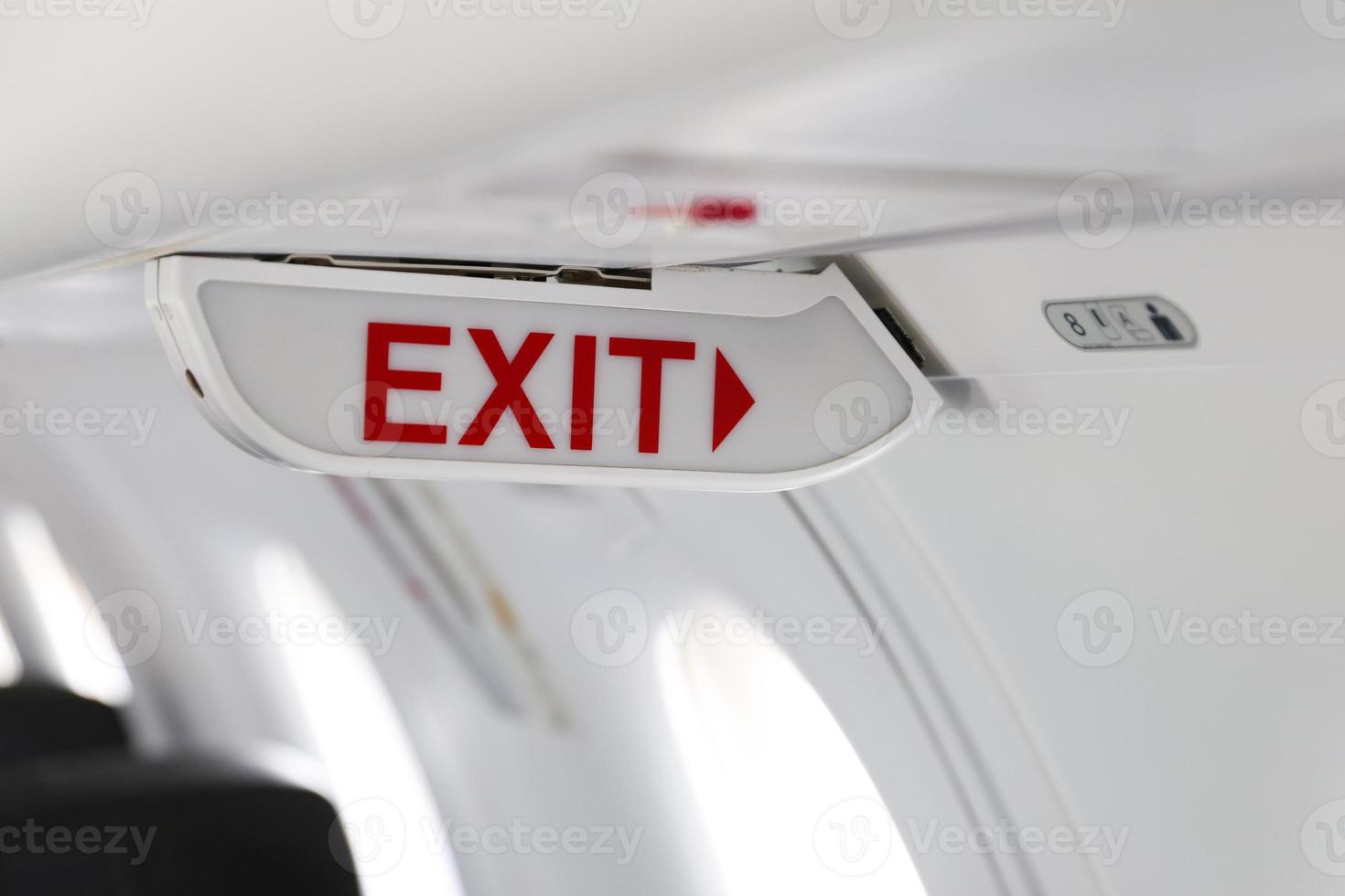 Exit Sign in Airplane photo