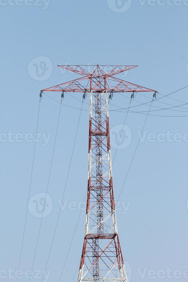 Red and White Electric Pole photo