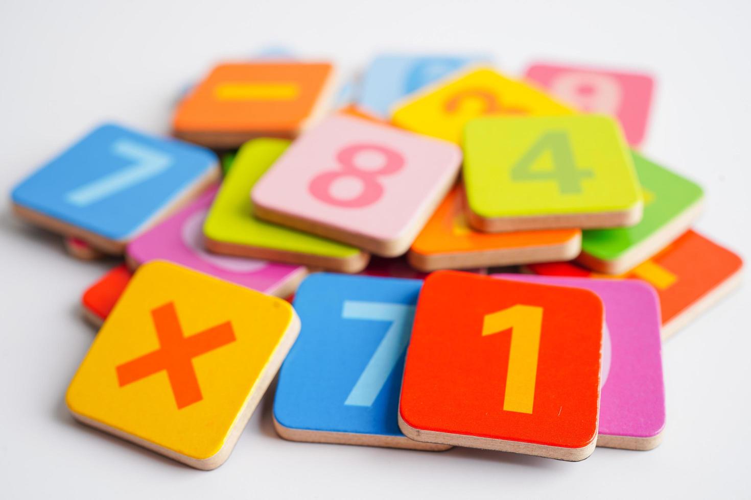 Number wood block cubes for learning Mathematic, education math concept. photo