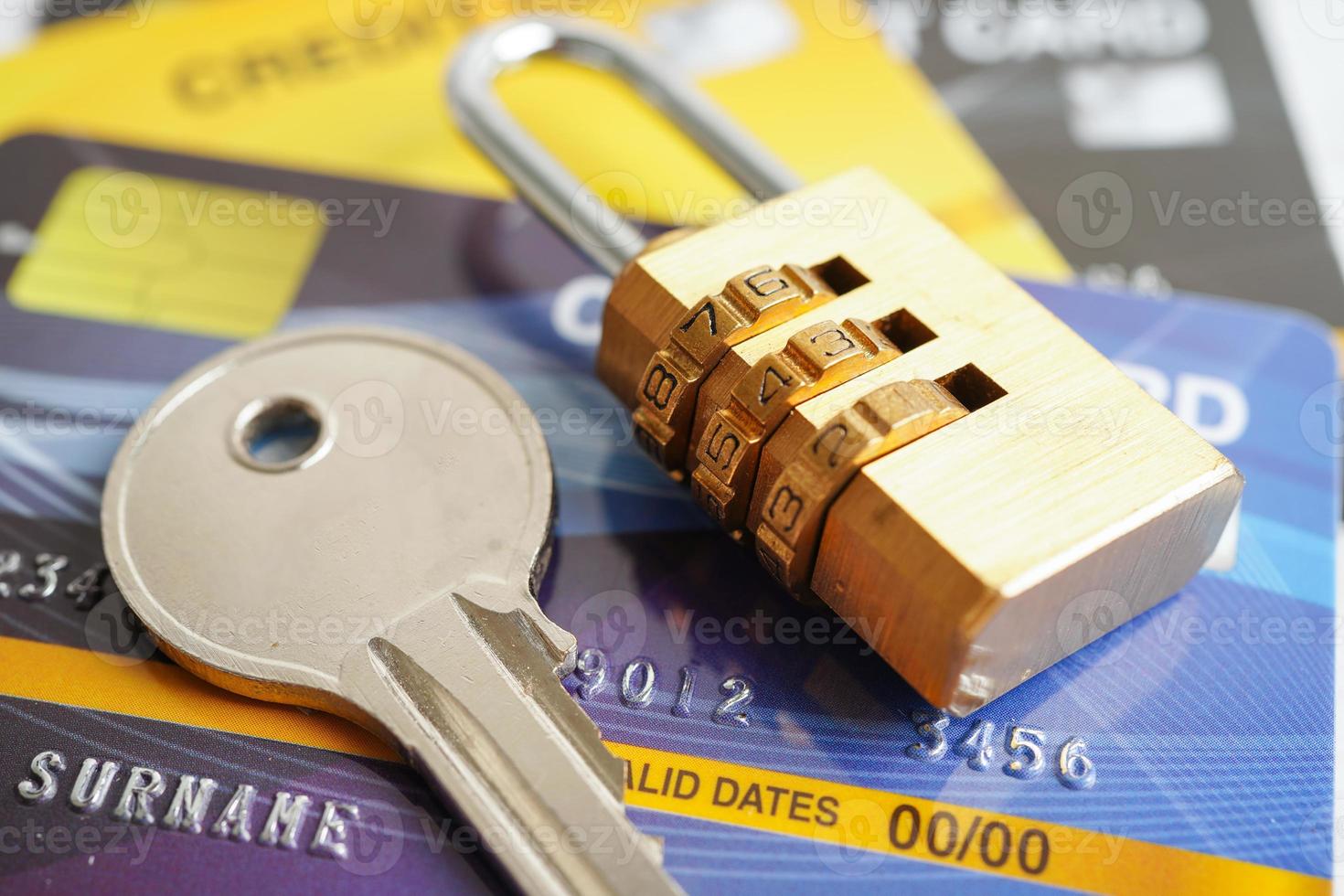 Credit card with password key lock, security finance business concept. photo