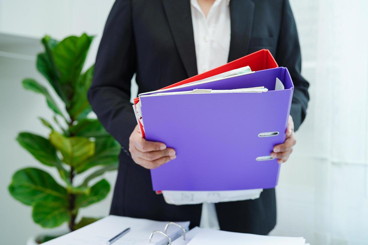 Business woman busy working with documents in office. photo