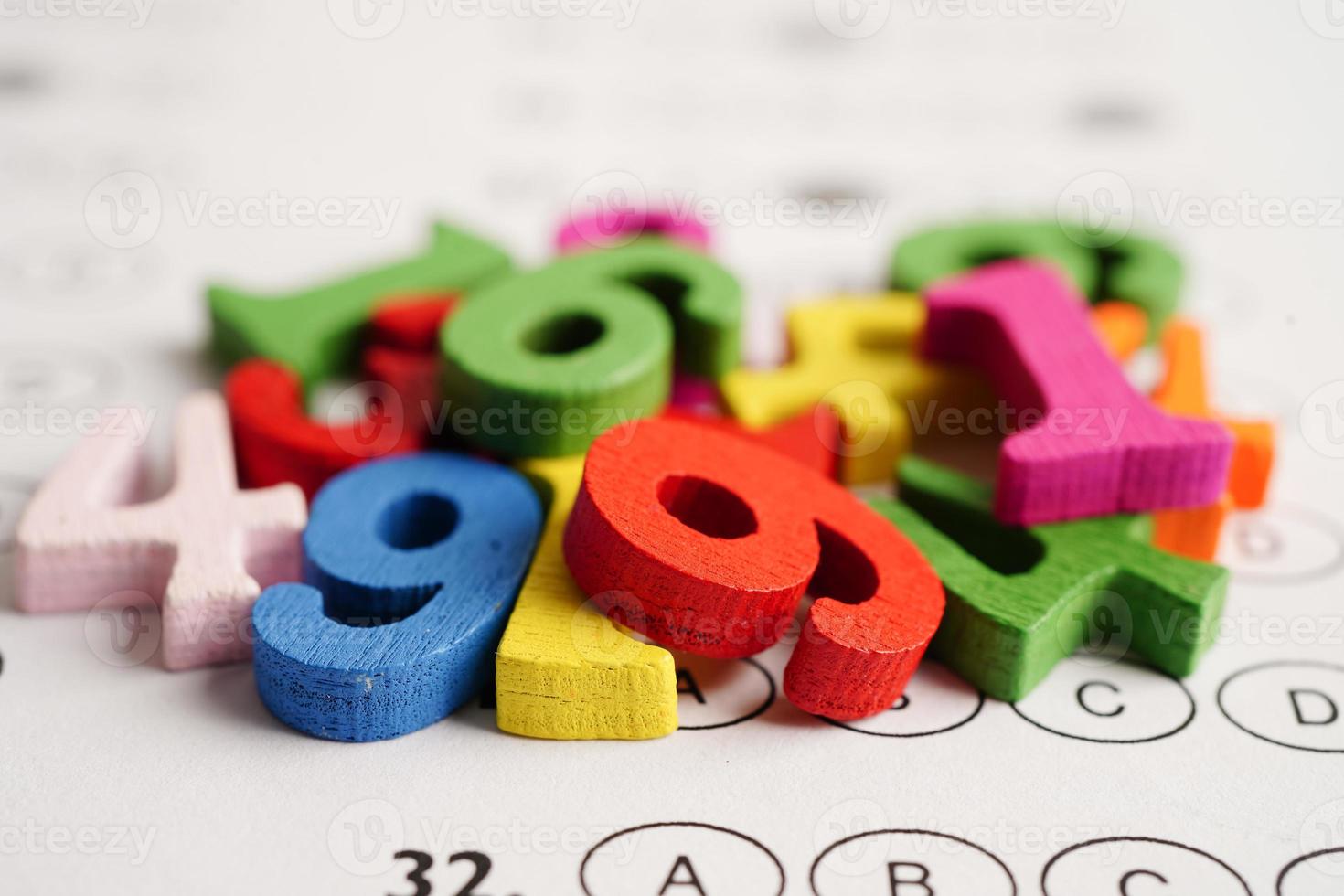 Math number with pencil on answer sheet test choice for learning Mathematic, education math concept. photo