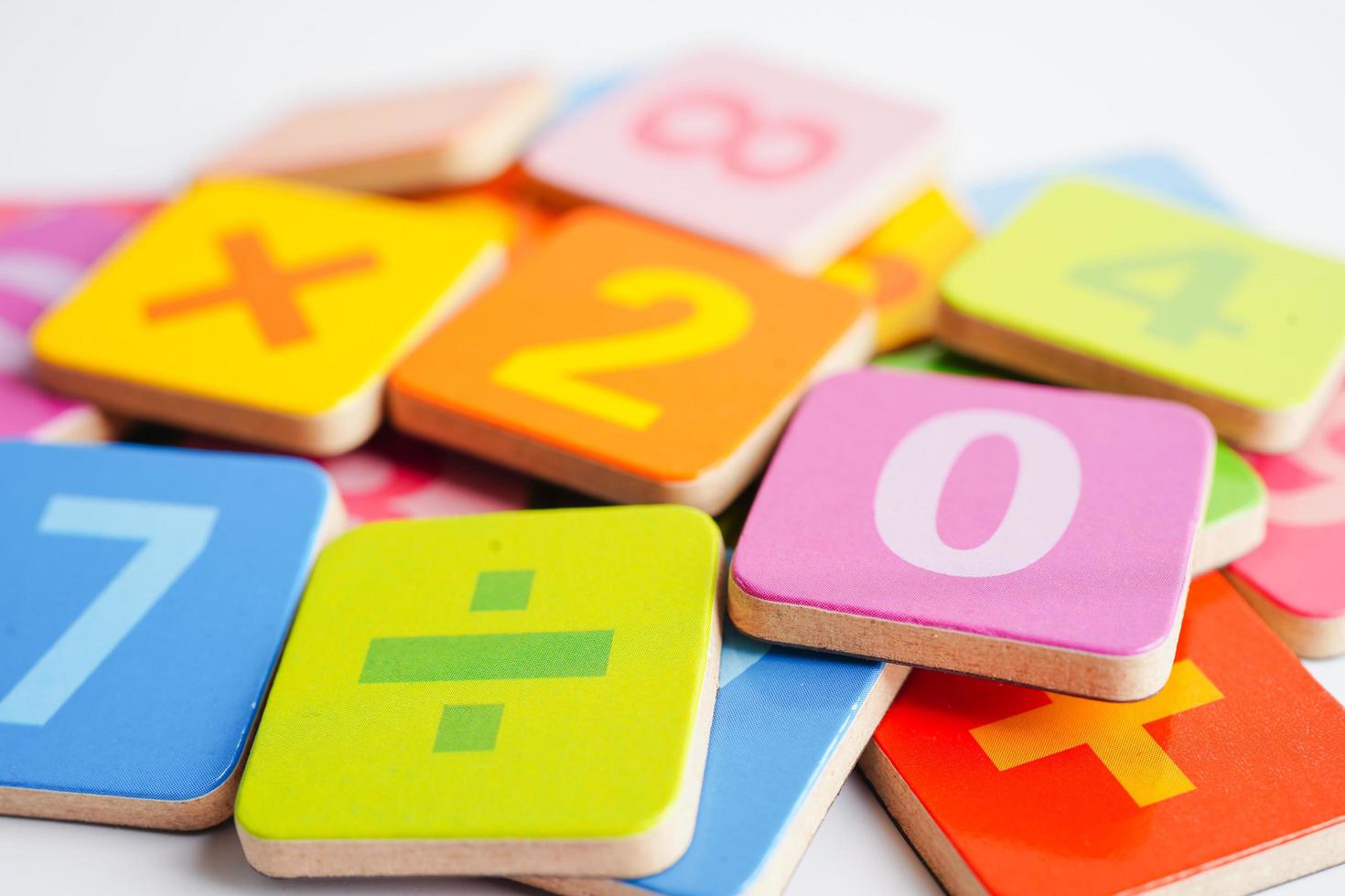 Number wood block cubes for learning Mathematic, education math concept. photo