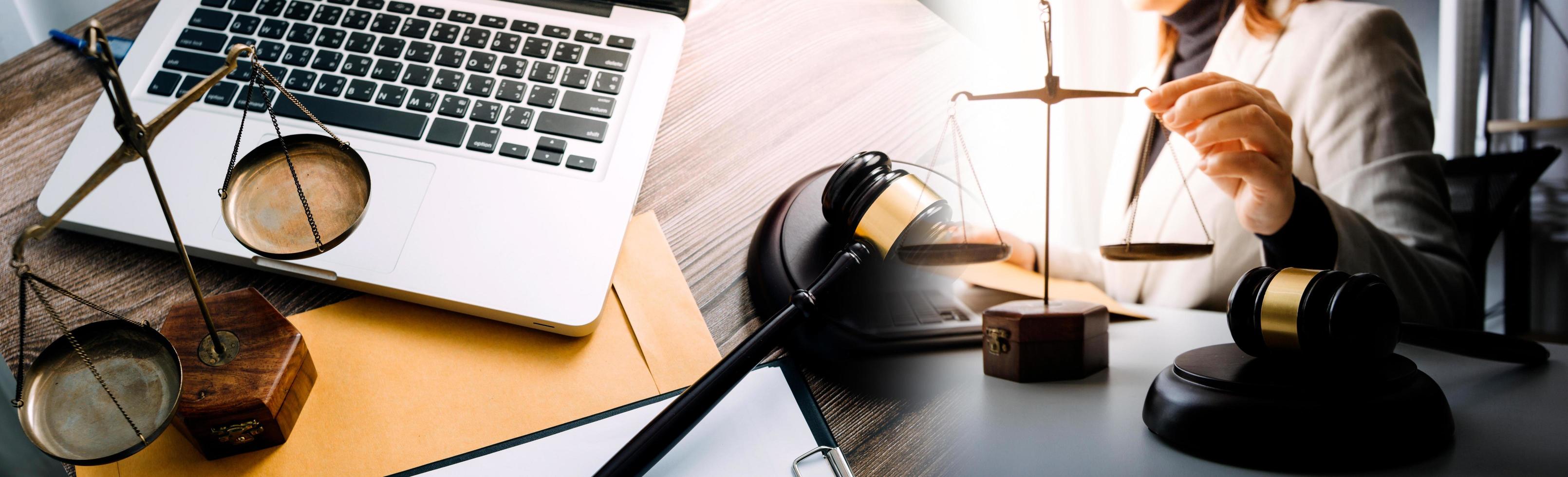 Business and lawyers discussing contract papers with brass scale on desk in office. Law, legal services, advice, justice and law concept picture with film grain effect photo