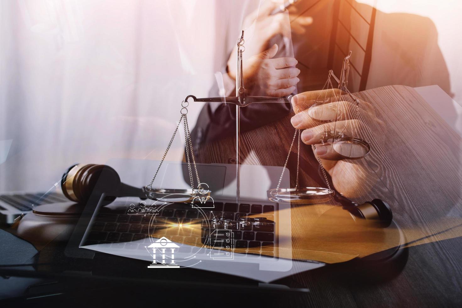 justice and law concept.Male judge in a courtroom on wooden table and Counselor or Male lawyer working in office. Legal law, advice and justice concept. photo