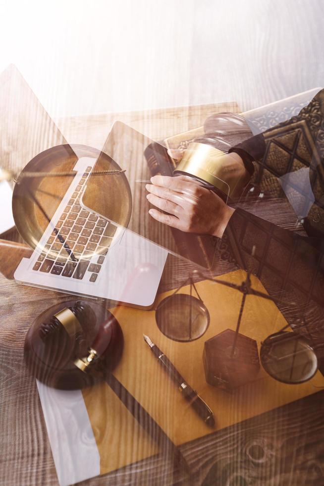 Business and lawyers discussing contract papers with brass scale on desk in office. Law, legal services, advice, justice and law concept picture with film grain effect photo