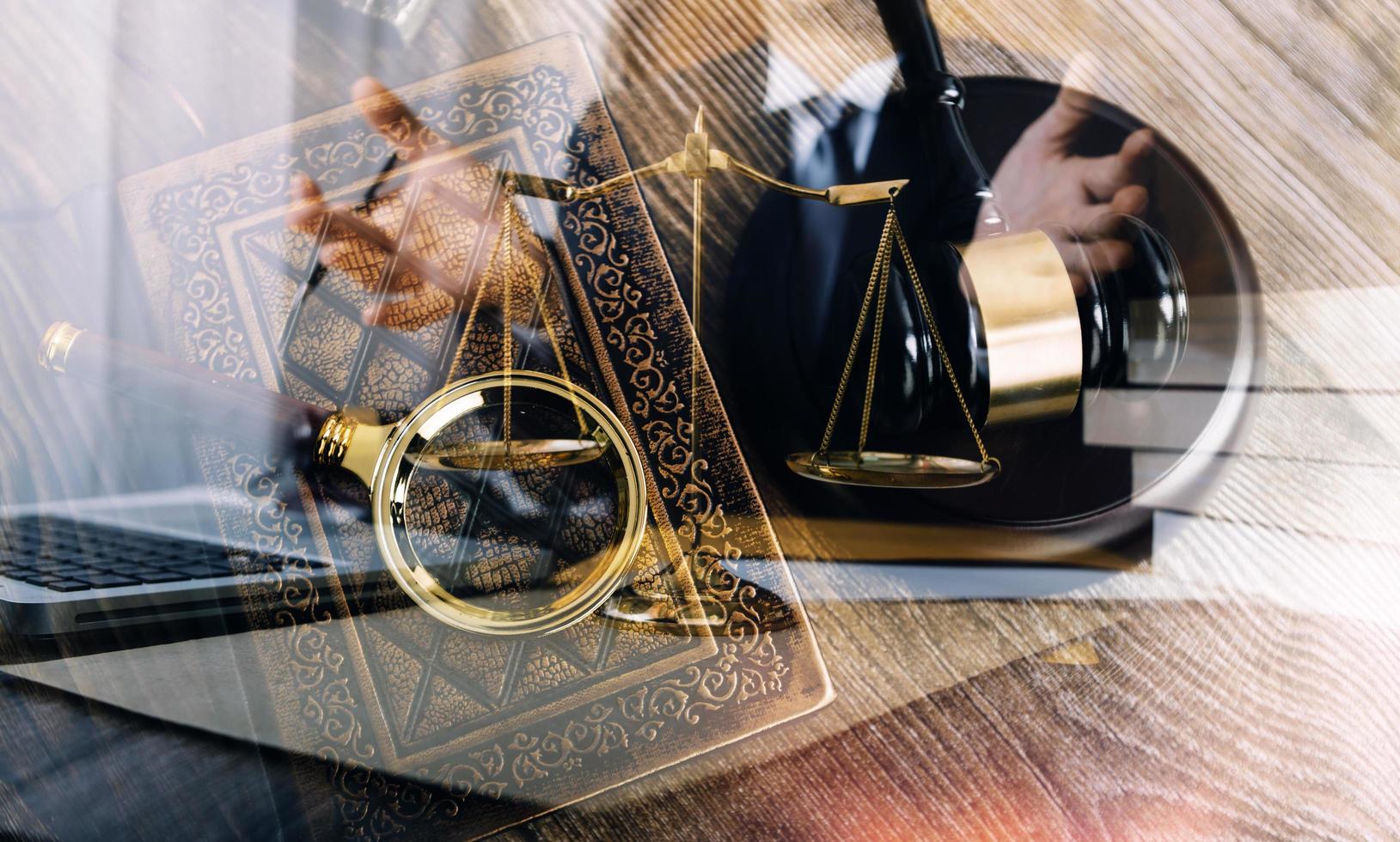 Business and lawyers discussing contract papers with brass scale on desk in office. Law, legal services, advice, justice and law concept picture with film grain effect photo