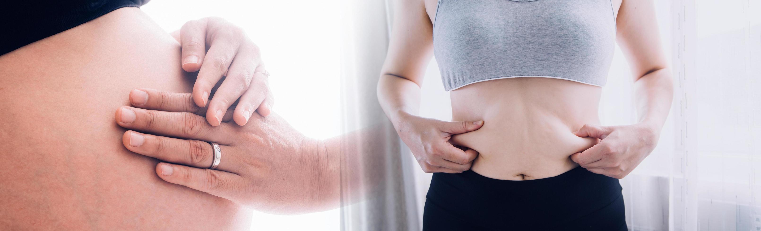 Fat woman hand holding excessive belly fat with measuring tape on white background. Shape up healthy stomach muscle and diet lifestyle to reduce belly concept. photo