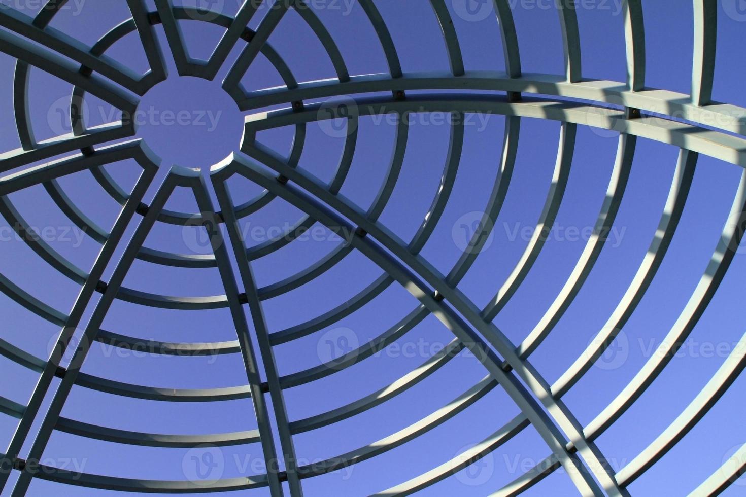 Centric roof pattern against blue sky photo