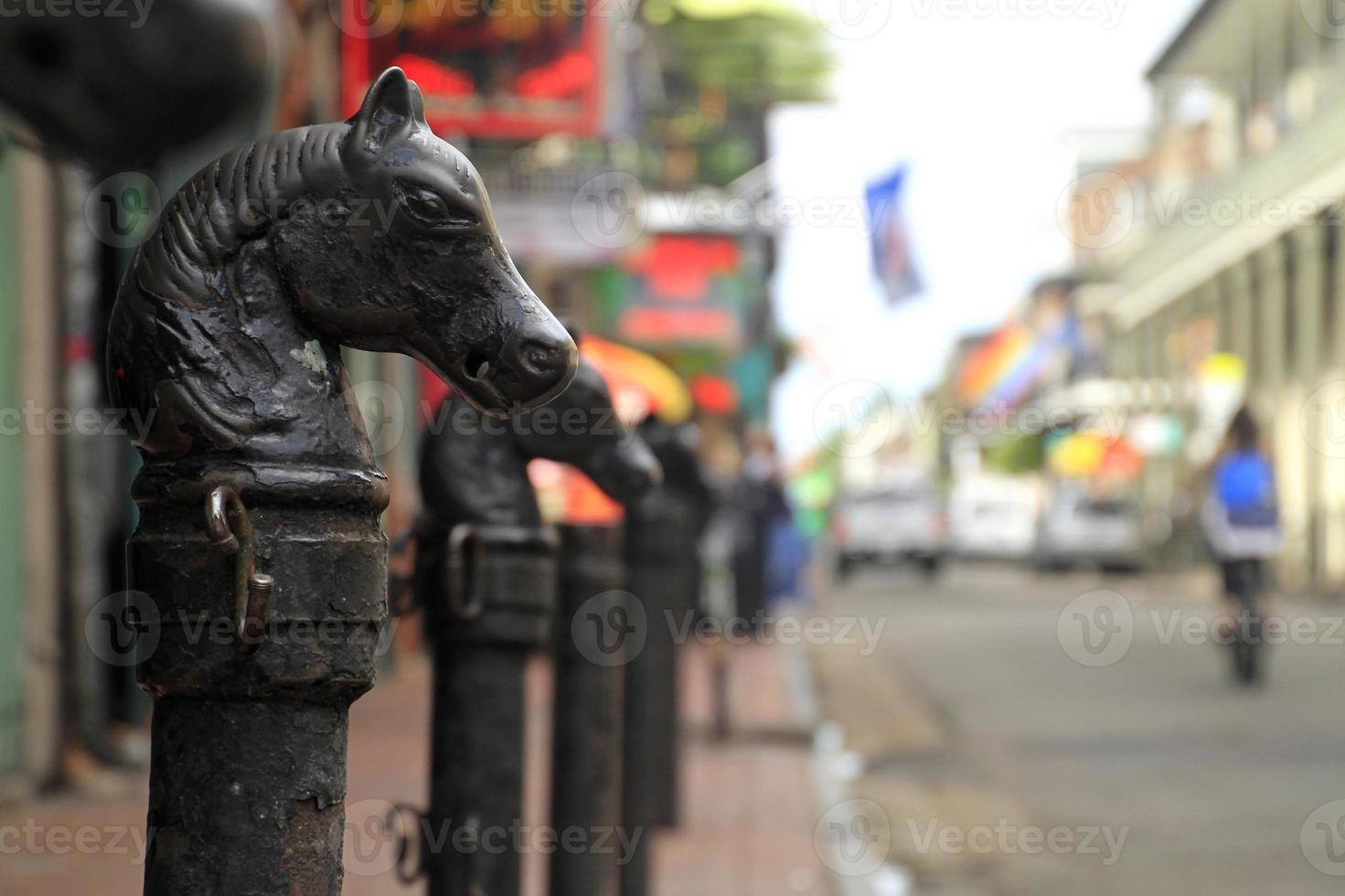 Metal horse heads along a street in New Orleans, Louisiana photo