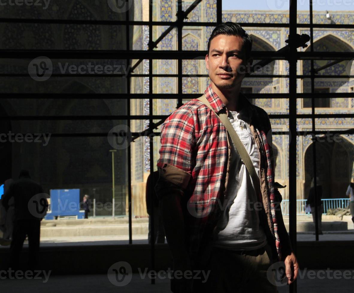 Young dark haired man in Iran with a confident expression on his face photo