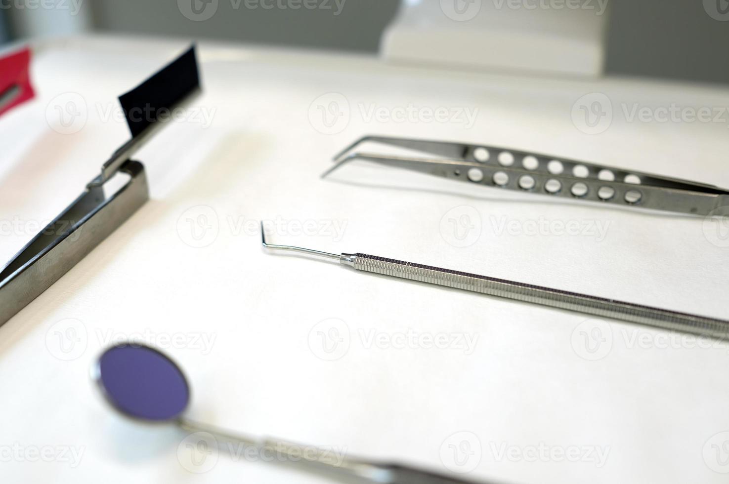 Dentist tools ready on the tray at the dentist's office photo