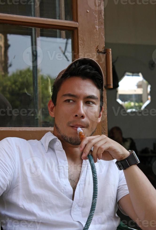 Man enjoying a hookah in a cafe in Beirut, Lebanon 10307356 Stock Photo