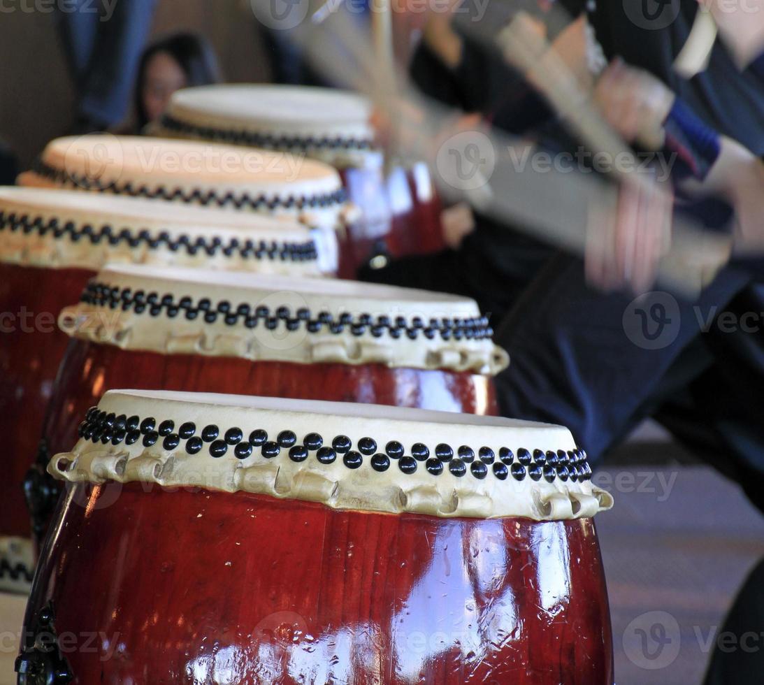 Japanese performers and traditional Taiko drums photo