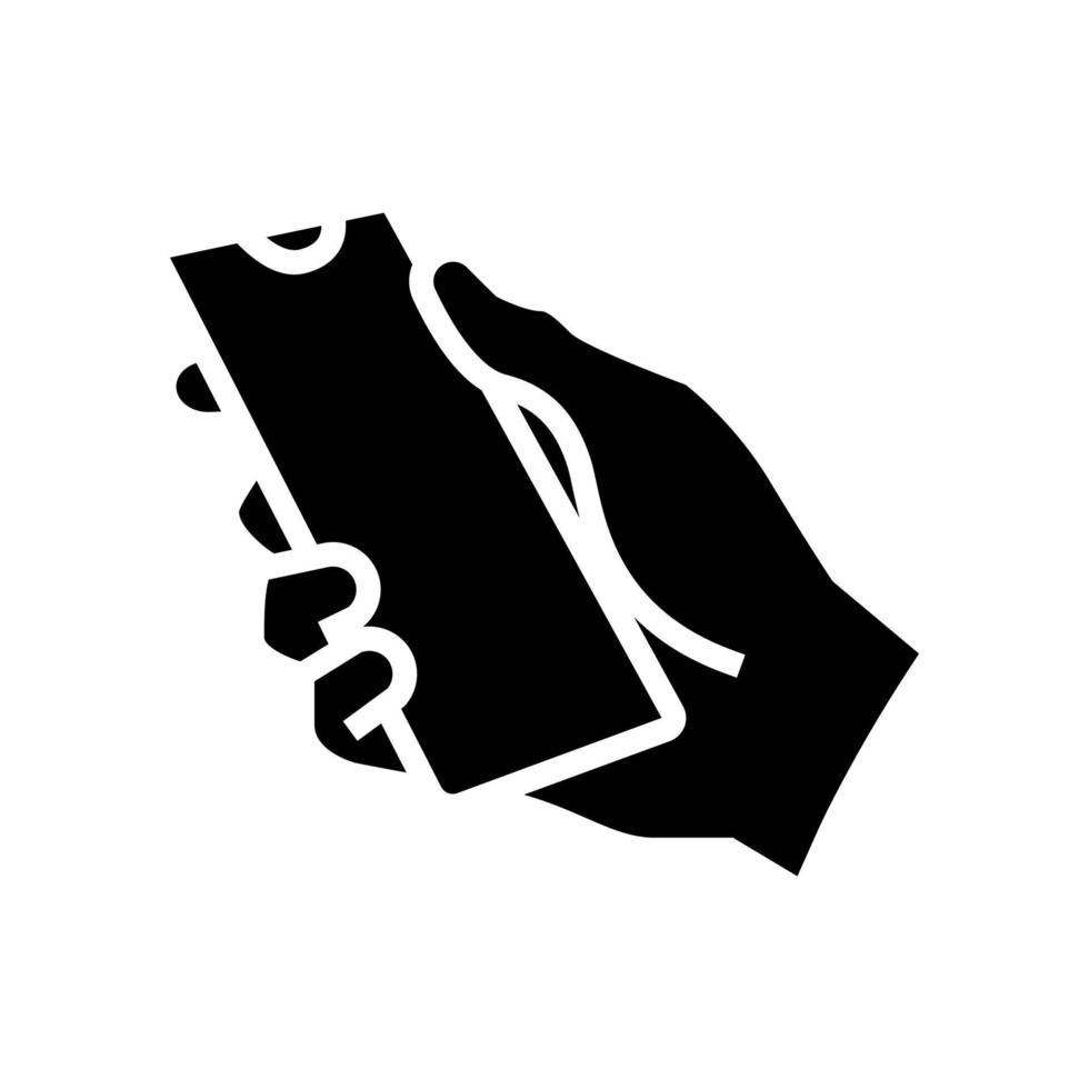 hand holding smartphone glyph icon vector illustration