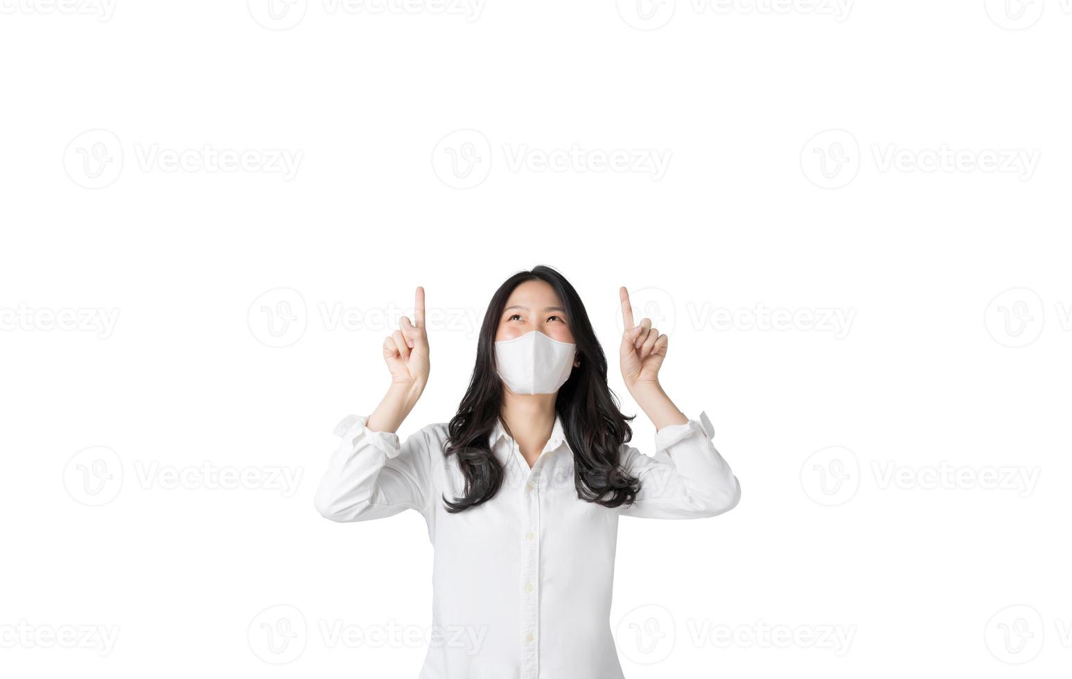 Young Asian woman wearing hygienic mask to prevent infection corona virus Air pollution pm2.5 in isolated on white background photo