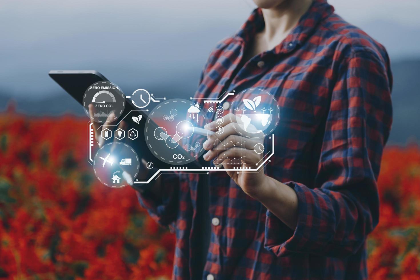 Selective focus. Architect team planning design apply renewable or solar energy on architectural building model with virtual reality technology hologram. Alternative green energy in future concept. photo