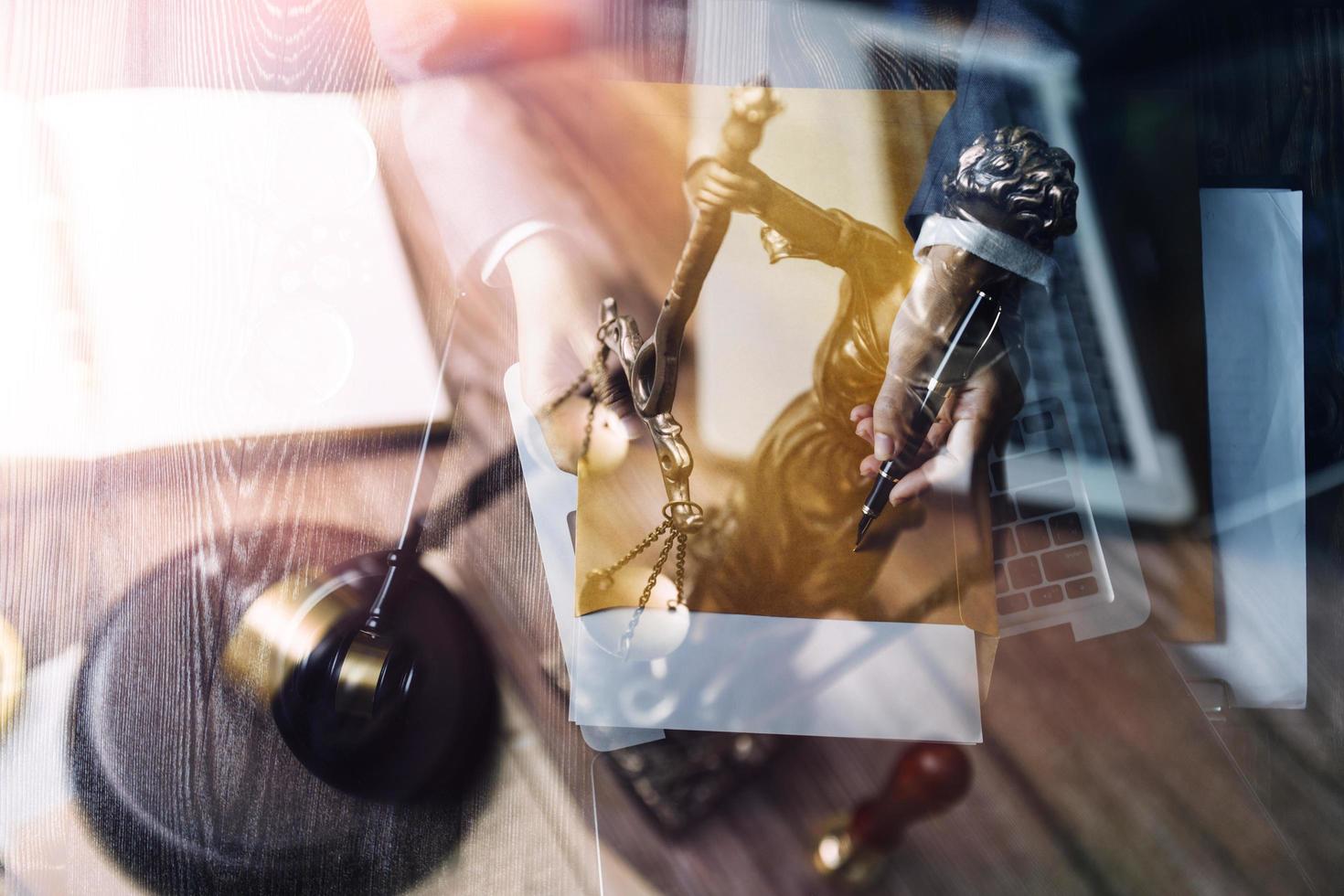 Business and lawyers discussing contract papers with brass scale on desk in office. Law, legal services, advice, justice and law concept picture with film grain effect photo