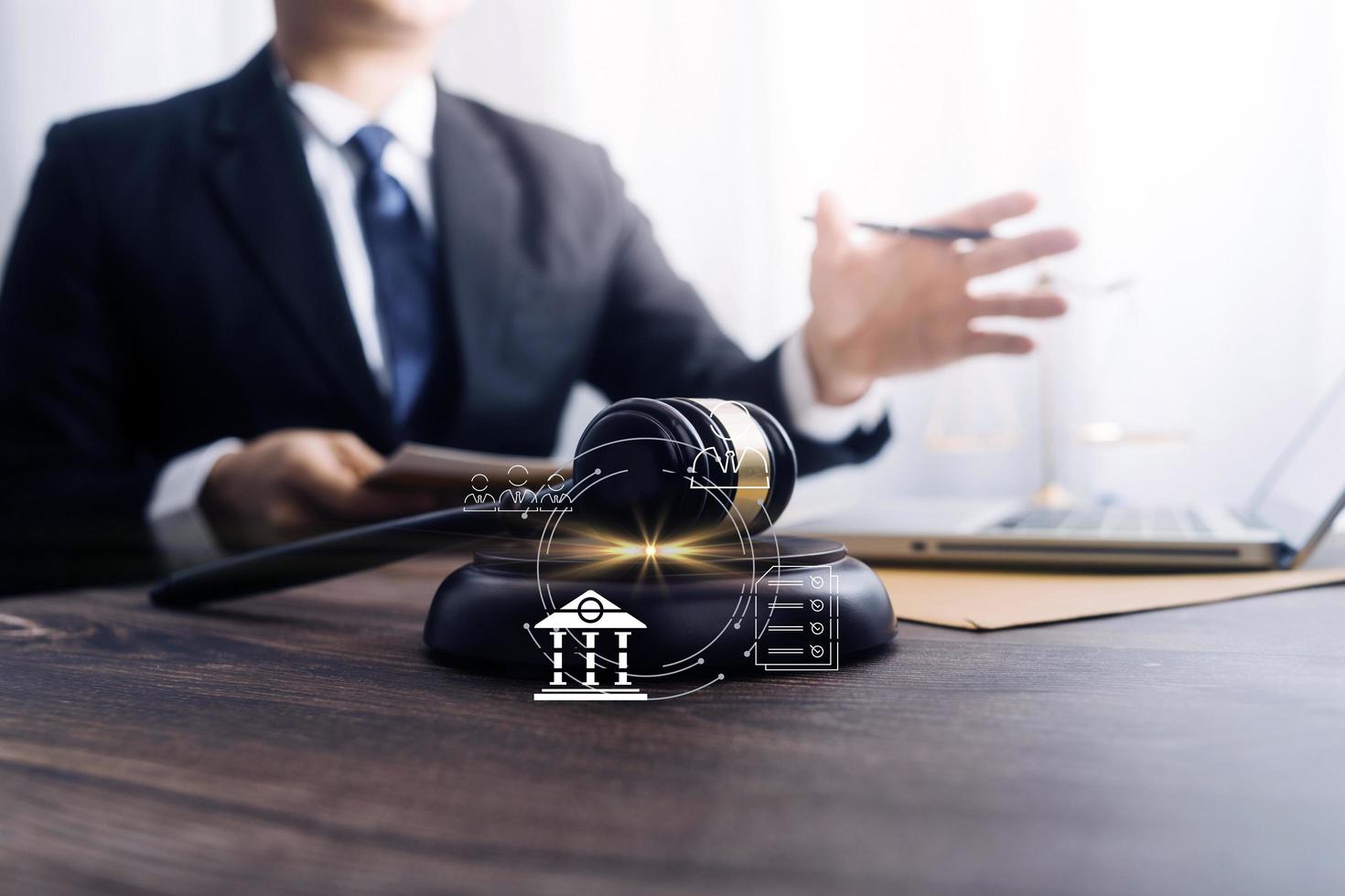 Business and lawyers discussing contract papers with brass scale on desk in office. Law, legal services, advice, justice and law concept picture with film grain effect photo