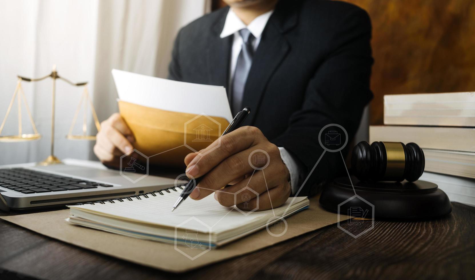 Business and lawyers discussing contract papers with brass scale on desk in office. Law, legal services, advice, justice and law concept picture with film grain effect photo