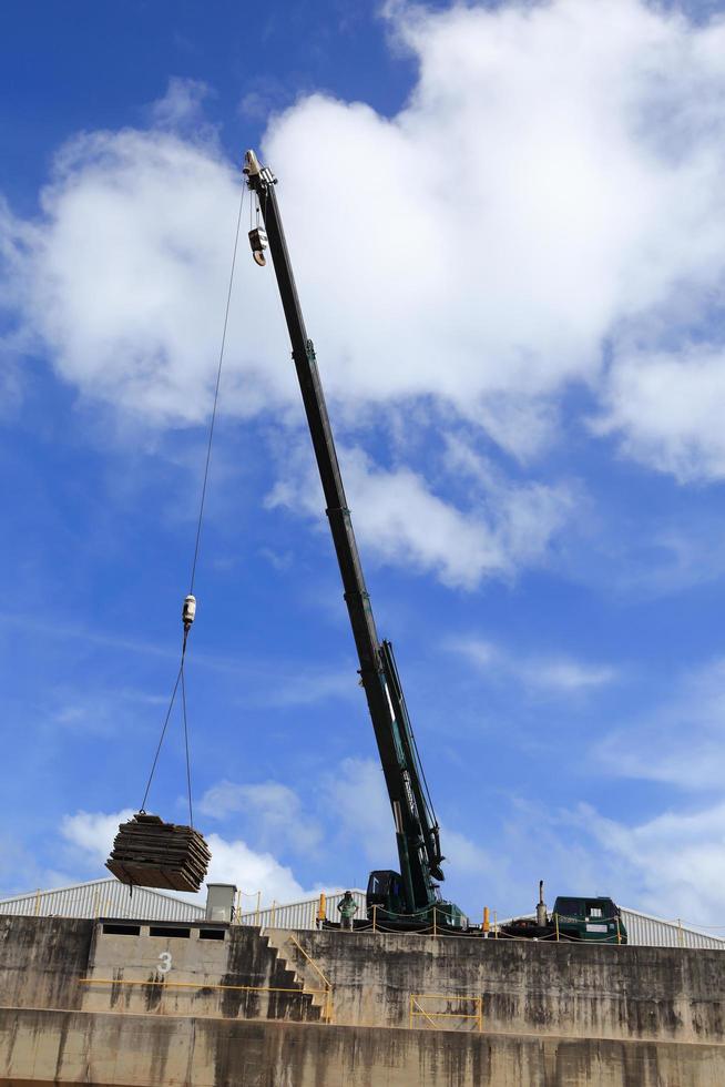 auto crane on construction site photo