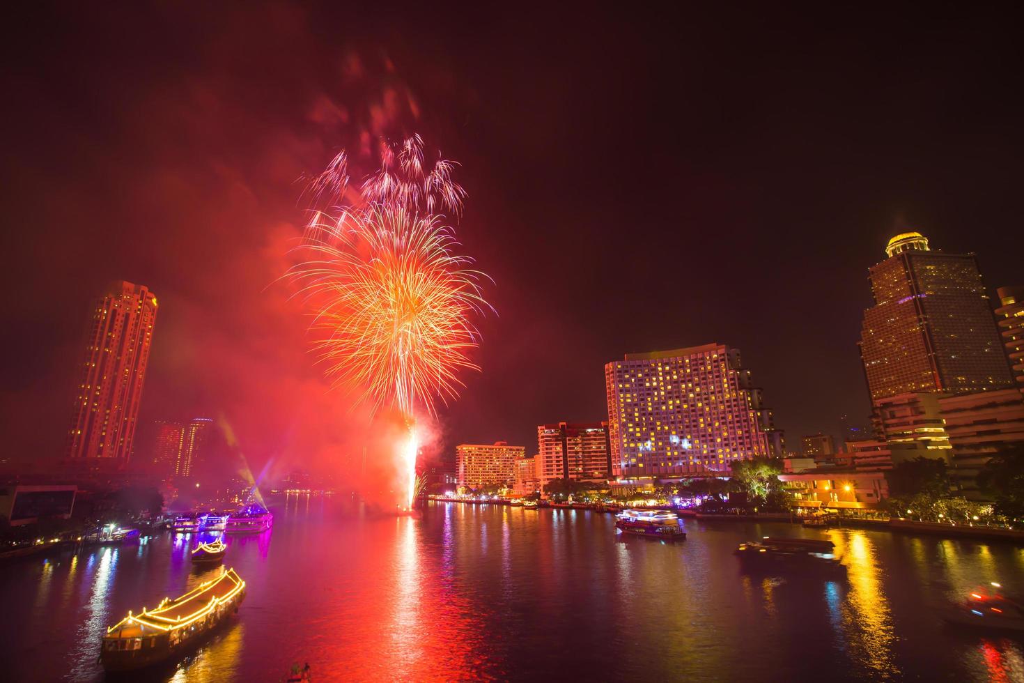 Firework with smoke at Chao Phraya River in countdown celebration party 2016 Bangkok Thailand photo