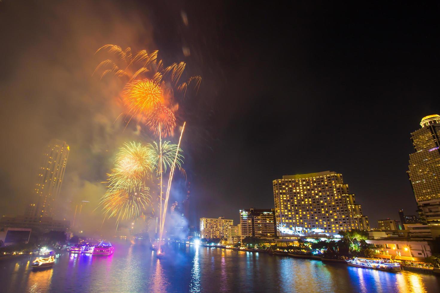 Firework with smoke at Chao Phraya River in countdown celebration party 2016 Bangkok Thailand photo