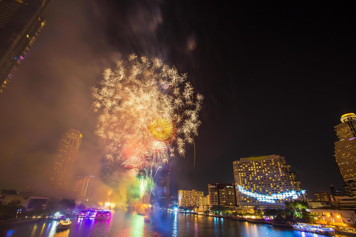 Firework with smoke at Chao Phraya River in countdown celebration party 2016 Bangkok Thailand photo