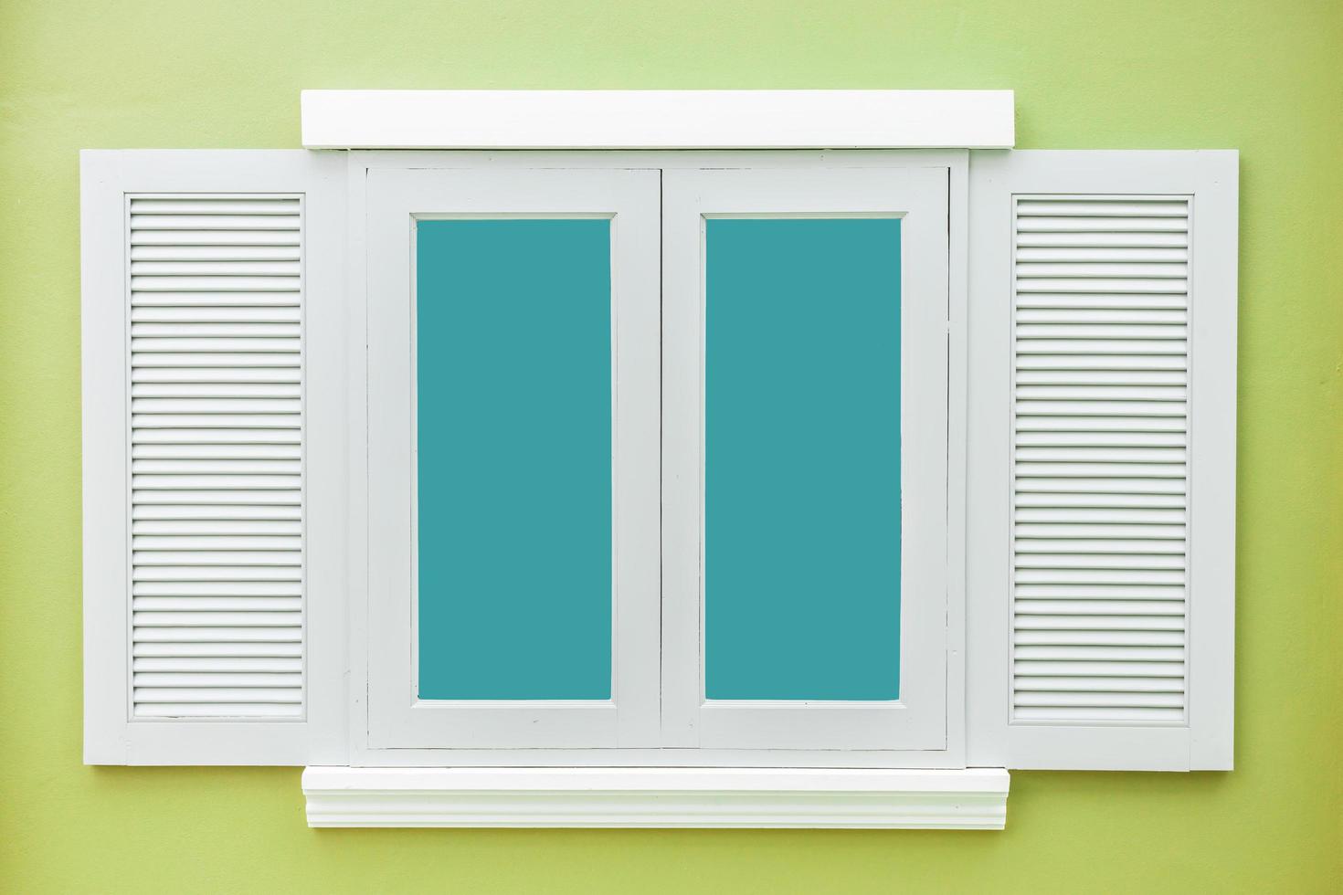 White window classic vintage on the color light green wall background photo