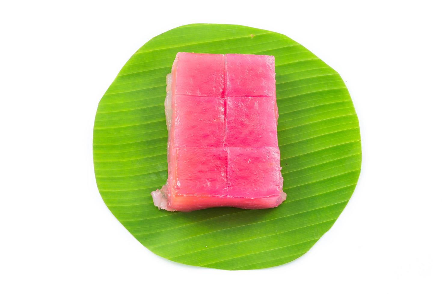 Kind of Thai sweetmeat, Multi Layer Sweet Cake Kanom Chan on banana leaf in white background photo