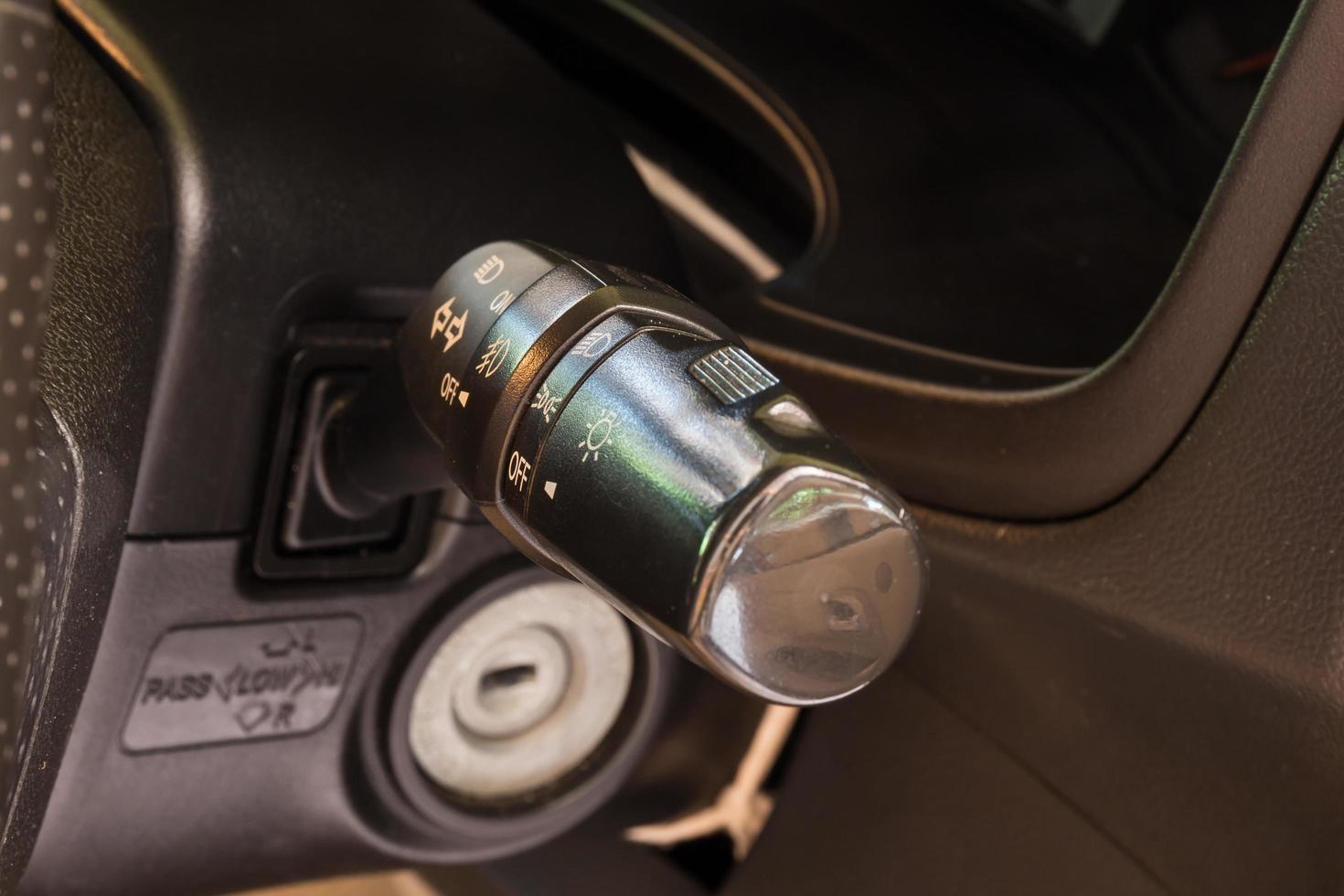 Car interior lighting control under steering switch photo