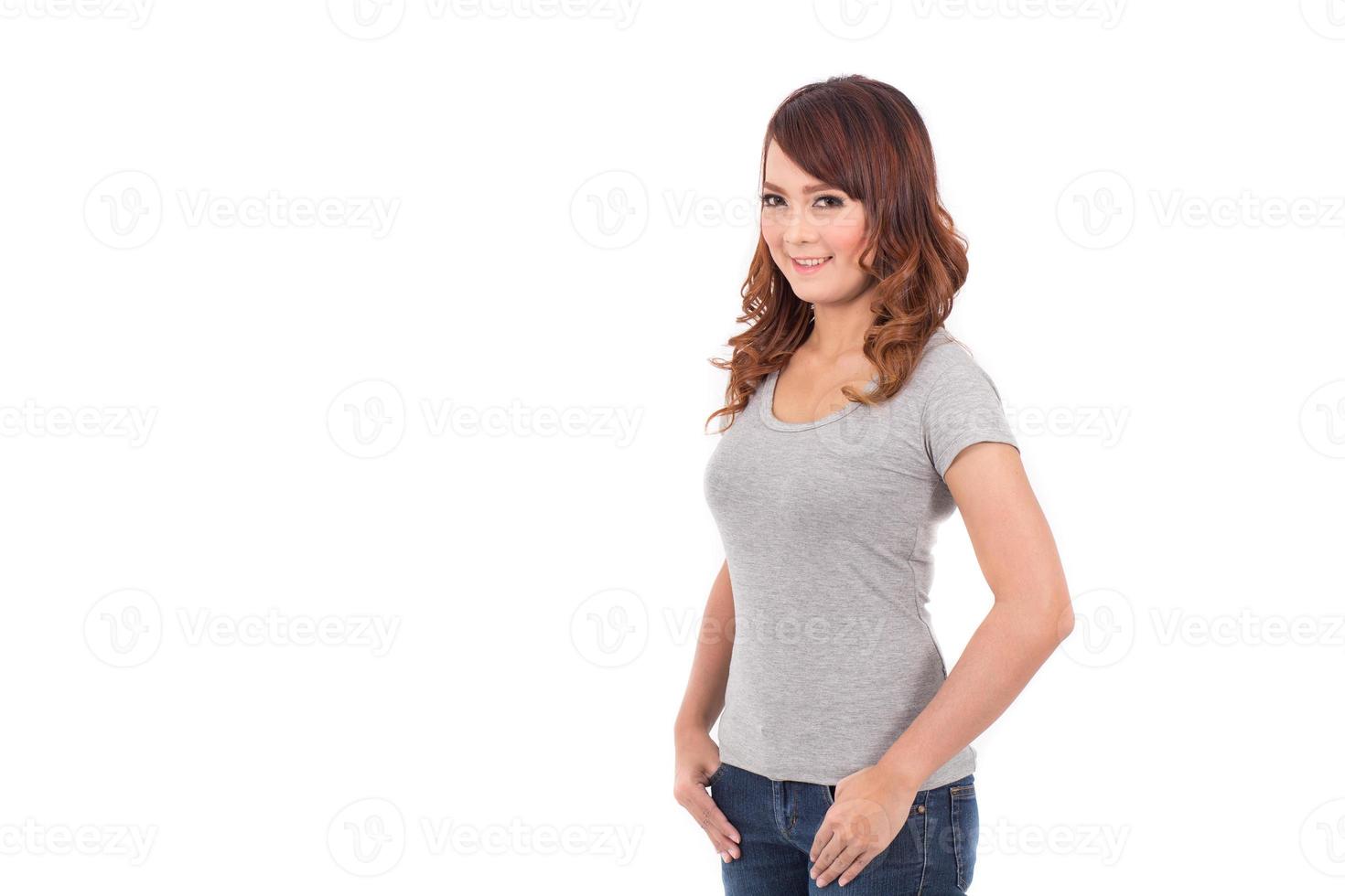 happy teenage girl in blank gray t-shirt on white background photo